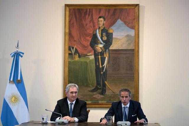The Director General of the International Atomic Energy Agency (IAEA), Rafael Grossi, speaks next to Argentina’s Foreign Minister Pablo Quirno (L), during the presentation of his candidacy for the United Nations secretary-general in Buenos Aires on December 22, 2025. (Photo by Juan Mabromata / AFP)