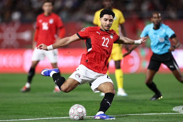 Egypt's forward #22 Omar Marmoush shoots but fails to score during the Africa Cup of Nations (CAN) group B football match between Egypt and Zimbabwe at Adrar Stadium in Agadir on December 22, 2025. (Photo by FRANCK FIFE / AFP)