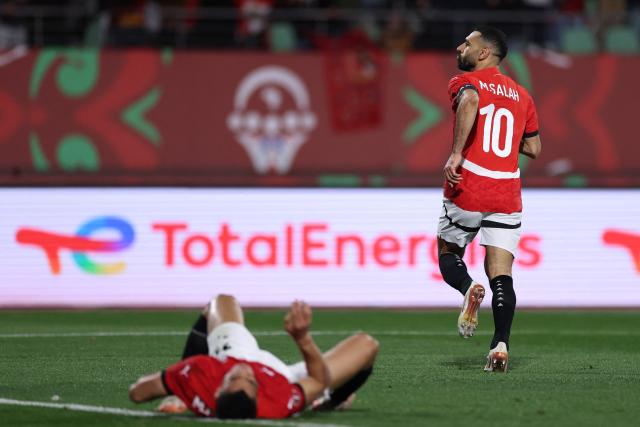 Egypt's forward #10 Mohamed Salah celebrates scoring the team's second goal during the Africa Cup of Nations (CAN) group B football match between Egypt and Zimbabwe at Adrar Stadium in Agadir on December 22, 2025. (Photo by FRANCK FIFE / AFP)