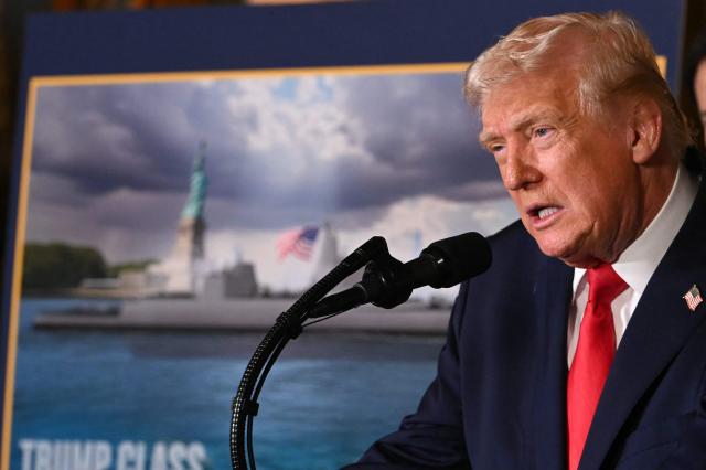 US President Donald Trump announces the US Navy’s new Golden Fleet initiative, unveiling a new class of frigates, at Mar-a-Lago in Palm Beach, Florida, on December 22, 2025. (Photo by ANDREW CABALLERO-REYNOLDS / AFP)