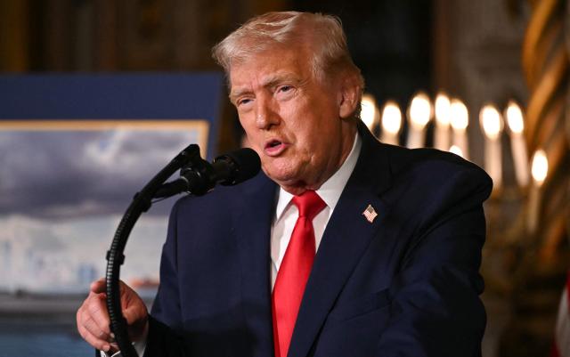 US President Donald Trump announces the US Navy’s new Golden Fleet initiative, unveiling a new class of warships, at Mar-a-Lago in Palm Beach, Florida, on December 22, 2025. (Photo by ANDREW CABALLERO-REYNOLDS / AFP)