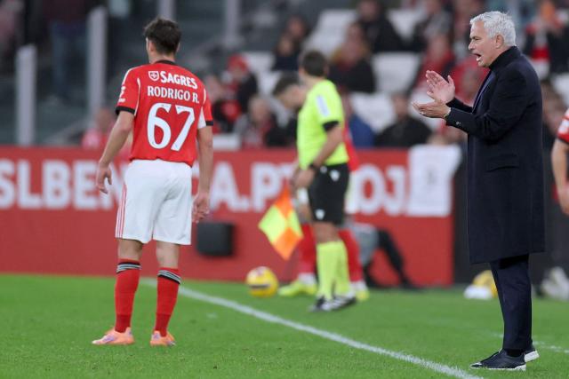 SL Benfica's Portuguese head coach #00 Jose Mourinho claps during the Portuguese League football match between SL Benfica and FC Famalicao at Estadio da Luz in Lisbon on December 22, 2025. (Photo by PATRICIA DE MELO MOREIRA / AFP)