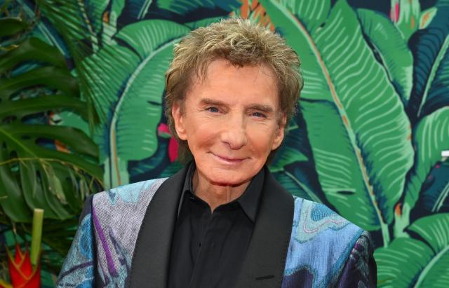(FILES) US singer/songwriter Barry Manilow arrives for the 76th Tony Awards at the United Palace in New York City on June 11, 2023. US singer-songwriter Barry Manilow announced December 22 he has been diagnosed with lung cancer, with plans to surgically treat the disease. 
The Grammy winner, 82, said in a post on Instagram that an MRI ordered after an extended bout of bronchitis "discovered a cancerous spot on my left lung that needs to be removed." 
"It's pure luck (and a great doctor) that it was found so early," he added. 
Manilow continued by saying he was planning to undergo surgery to remove the cancer, cancelling shows scheduled for the rest of December and January as a result. (Photo by ANGELA WEISS / AFP)