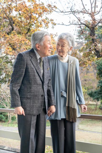 This handout photo taken on December 8, 2025 and released by the Imperial Household Agency of Japan shows Emperor Emeritus Akihito (L) and Empress Emerita Michiko posing for a photo at the Imperial Palace in Tokyo, marking Akihito's 92nd birthday on December 23. (Photo by Handout / Imperial Household Agency of Japan / AFP) / NO SALES, AP PROVIDES ACCESS TO THIS PUBLICLY DISTRIBUTED HANDOUT PHOTO PROVIDED BY THE IMPERIAL HOUSEHOLD AGENCY OF JAPAN; MANDATORY CREDIT.