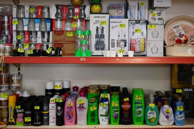 This photograph shows shampoos, soaps, and other goods with price tags in levs and euros on a shelf in a grocery store in the village of Chuprene, northwestern Bulgaria on December 7, 2025. Bulgaria shaken by political uncertainty, with the latest short-lived government resigning last week -- becomes the single currency area's 21st member on January 1, nearly 19 years after the country of 6.4 million people joined the European Union. (Photo by Nikolay DOYCHINOV / AFP)