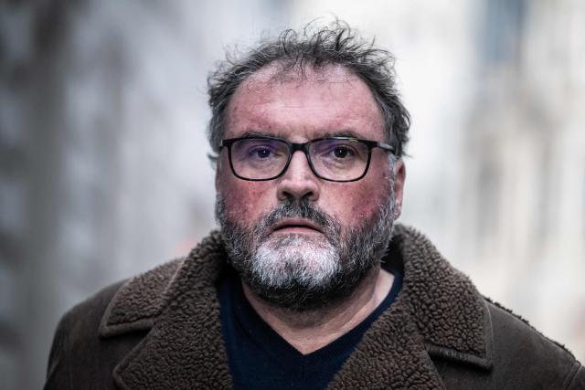 (FILES) French former anaesthetist Frederic Pechier arrives at Besancon's courthouse as his lawyer will present from today onwards the defense's closing arguments in Besancon, eastern France, on December 15, 2025. Frederic Pechier, sentenced to life imprisonment for 30 poisonings, 12 of which were fatal, behaved like "a serial killer" with the Besancon clinic where he worked as an anesthetist as his "playground", according to the court's reasoning obtained on December 232, 2025 by AFP. (Photo by ARNAUD FINISTRE / AFP)