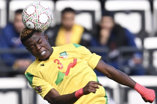 Benin's defender #03 Tamimou Ouorou heads the ball during the Africa Cup of Nations (CAN) Group D football match between Democratic Republic of Congo and Benin at Al Medina Stadium in Rabat on December 23, 2025. (Photo by SEBASTIEN BOZON / AFP)