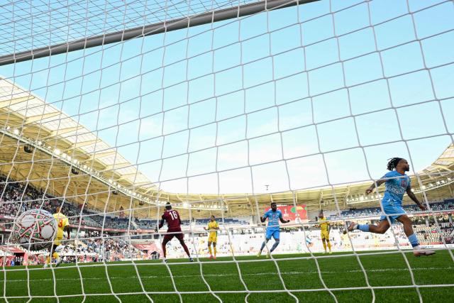Democratic Republic Of Congo's forward #10 Theo Bongonda celebrates his goal during the Africa Cup of Nations (CAN) Group D football match between Democratic Republic of Congo and Benin at Al Medina Stadium in Rabat on December 23, 2025. (Photo by SEBASTIEN BOZON / AFP)
