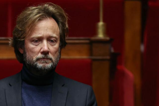 President of Socialistes et Apparentes parliamentary group Boris Vallaud looks on during a session of questions to the government at The National Assembly, France's lower house parliament, in Paris on December 23, 2025. (Photo by Thomas SAMSON / AFP)