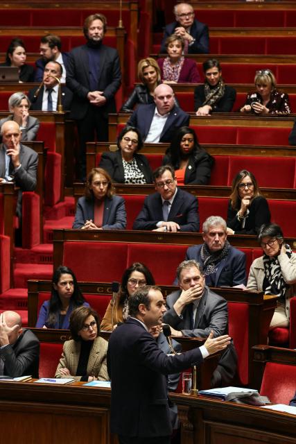 France's Prime Minister Sebastien Lecornu speaks during a session of questions to the government at The National Assembly, France's lower house parliament, in Paris on December 23, 2025. (Photo by Thomas SAMSON / AFP)