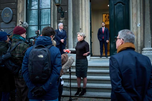 Informateur Rianne Letschert speaks to the press aftre meeting with party leaders of Dutch centre-left social liberal party Democrats 66 (D66), Dutch centre-right wing party Christian Democratic Appeal (CDA) and Dutch right conservative liberal party People's Party for Freedom and Democracy (VVD) to lay the groundwork for a coalition agreement outside the Huis Huguetan, in The Hague, on December 23, 2025. (Photo by Phil Nijhuis / ANP / AFP) / Netherlands OUT
