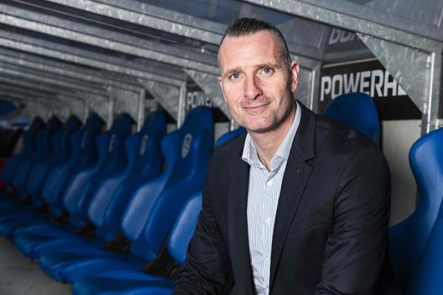 KRC Genk's Belgian new head coach Nicky Hayen poses for a photograph as he is presented to the press at the Cegeka Arena in Genk, on December 23, 2025. (Photo by Tom Goyvaerts / Belga / AFP) / Belgium OUT