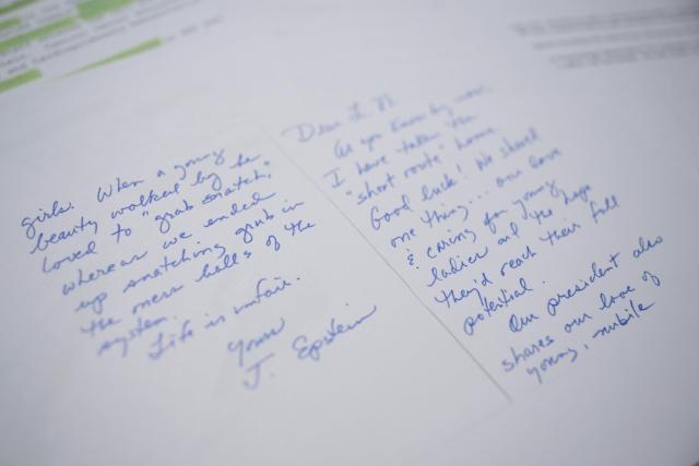 This photo illustration taken in Washington, DC, on December 23, 2025 shows a new batch of files released on Tuesday by the US government in relation to the notorious late sex offender Jeffrey Epstein. The latest release contains previously unseen material from the investigation into Epstein, a wealthy US financier who died in jail in 2019 while awaiting trial for sex trafficking underage girls. (Photo by AFP)