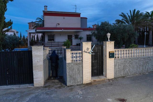 Traces of blood can be seen on the ground in front of the entrance to the house where two German citizens were murdered yesterday in Elche, on December 23, 2025. Two German persons were beaten to death in a brawl that got out of hand, Spain's El Pais newspaper reported today, with police saying they had arrested two suspects in the case. The violent scene took place yesterday in a rural area on the Costa Blanca, close to the town of Elche, the regional police service said in a statement to AFP. (Photo by Pablo MIRANZO / AFP)