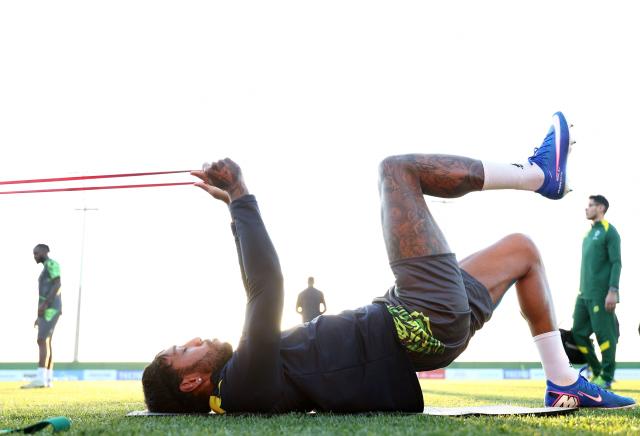 Guest Gabon's forward #09 Pierre-Emerick Aubameyang (C) stretches during a training session at the Stadium in in Taghzout, on December 23, 2025, on the eve of the 2025 Africa Cup of Nations (CAN) football match between Cameroon and Gabon. (Photo by FRANCK FIFE / AFP)