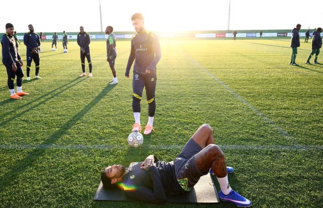 Gabon's forward #09 Pierre-Emerick Aubameyang stretches during a training session at the Stadium in in Taghzout, on December 23, 2025, on the eve of the 2025 Africa Cup of Nations (CAN) football match between Cameroon and Gabon. (Photo by FRANCK FIFE / AFP)