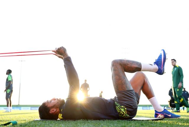 Gabon's forward #09 Pierre-Emerick Aubameyang stretches during a training session at the Stadium in Taghzout, on December 23, 2025, on the eve of the 2025 Africa Cup of Nations (CAN) football match between Cameroon and Gabon. (Photo by FRANCK FIFE / AFP)