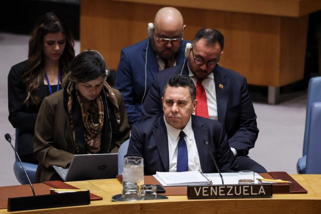 Venezuela's ambassador to the UN Samuel Moncada listens during a United Nations Security Council meeting on US military actions against Venezuela, at United Nations headquarters on December 23, 2025 in New York. (Photo by ANGELA WEISS / AFP)