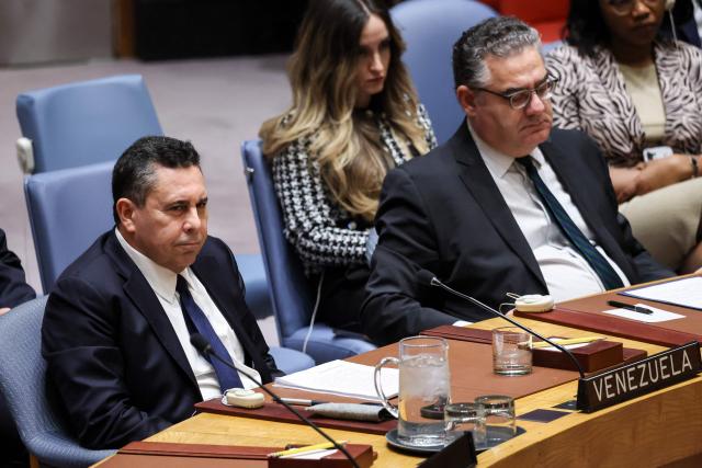 Venezuela's ambassador to the UN Samuel Moncada listens during a United Nations Security Council meeting on US military actions against Venezuela, at United Nations headquarters on December 23, 2025 in New York. (Photo by ANGELA WEISS / AFP)