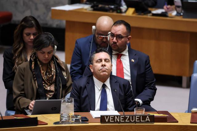 Venezuela's ambassador to the UN Samuel Moncada listens during a United Nations Security Council meeting on US military actions against Venezuela, at United Nations headquarters on December 23, 2025 in New York. (Photo by ANGELA WEISS / AFP)