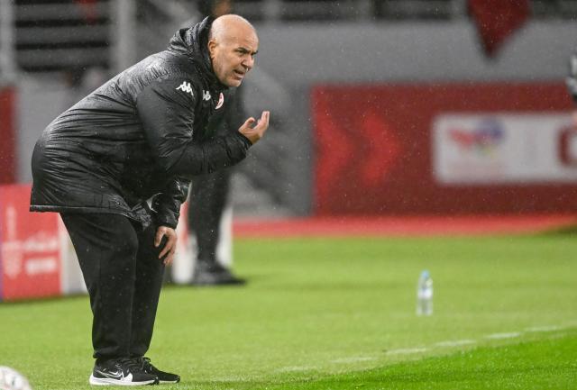 Tunisia's coach Samy Trabelsi reacts during the Africa Cup of Nations (CAN) Group C football match between Tunisia and Uganda at Rabat Olympic Stadium in Rabat on December 23, 2025. (Photo by SEBASTIEN BOZON / AFP)
