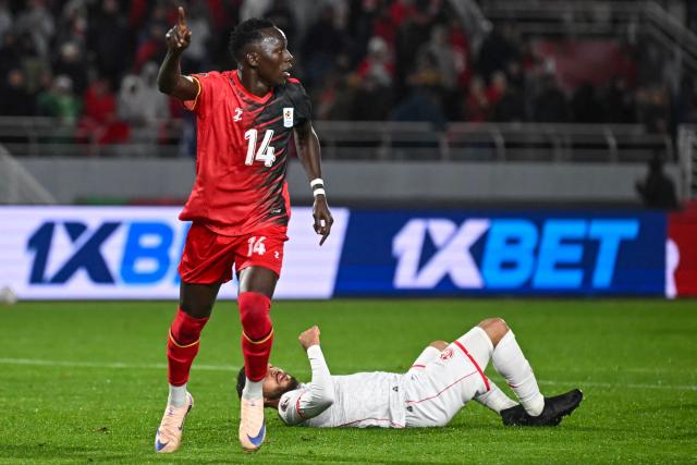 Uganda's forward #14 Denis Omedi celebrates his goal during the Africa Cup of Nations (CAN) Group C football match between Tunisia and Uganda at Rabat Olympic Stadium in Rabat on December 23, 2025. (Photo by Paul ELLIS / AFP)