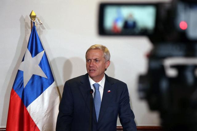 Chile's President-elect Jose Antonio Kast speaks during a press conference for national and international media after a meeting with business leaders from various production sectors at the Swissotel in Quito on December 23, 2025. Kast, 59, arrived in Quito to discuss irregular migration, terrorism and drug trafficking. (Photo by Galo Paguay / AFP)