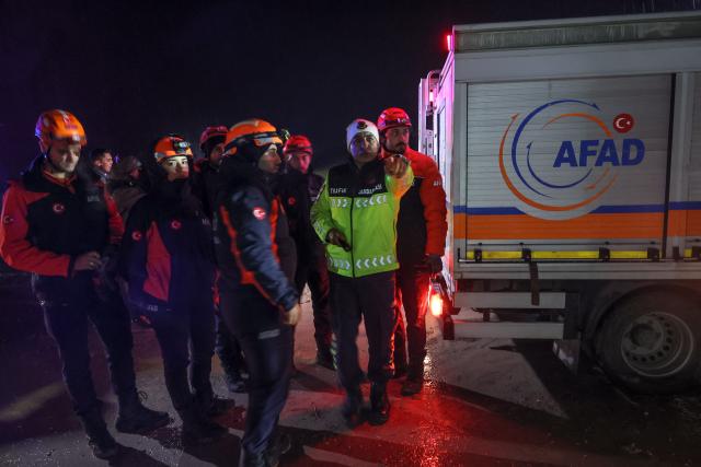 Rescuers work at the wreckage site as search and rescue operations continue following the crash of a Libya-bound business jet carrying Libyan Chief of Staff General Muhammad Ali Ahmed Al-Haddad, found about 1.2 miles (2 km) south of Kesikkavak village in the Haymana district of Ankara on December 24, 2025. The head of Libya's armed forces and four other passengers died on December 23 when their business jet crashed shortly after taking off from Ankara, officials in Turkey's capital and Tripoli said.
The wreckage of their Falcon 50 aircraft was located by Turkish security personnel in the Haymana district near Ankara, Turkish Interior Minister Ali Yerlikaya said. (Photo by ADEM ALTAN / AFP)