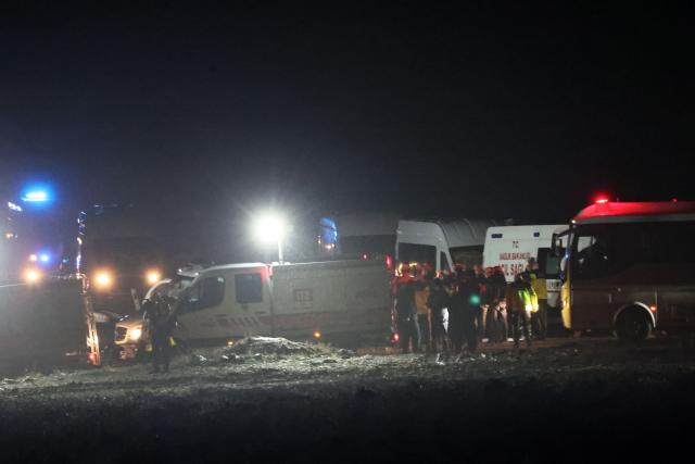Rescuers work at the wreckage site as search and rescue operations continue following the crash of a Libya-bound business jet carrying Libyan Chief of Staff General Muhammad Ali Ahmed Al-Haddad, found about 1.2 miles (two km) south of Kesikkavak village in the Haymana district of Ankara on December 24, 2025. The head of Libya's armed forces and four other passengers died on Tuesday when their business jet crashed shortly after taking off from Ankara, officials in Turkey's capital and Tripoli said.
The wreckage of their Falcon 50 aircraft was located by Turkish security personnel in the Haymana district near Ankara, Turkish Interior Minister Ali Yerlikaya said. (Photo by ADEM ALTAN / AFP)
