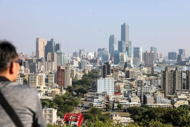 The Kaohsiung downtown is seen from a mountain in Kaohsiung on December 23, 2025. (Photo by I-Hwa Cheng / AFP)