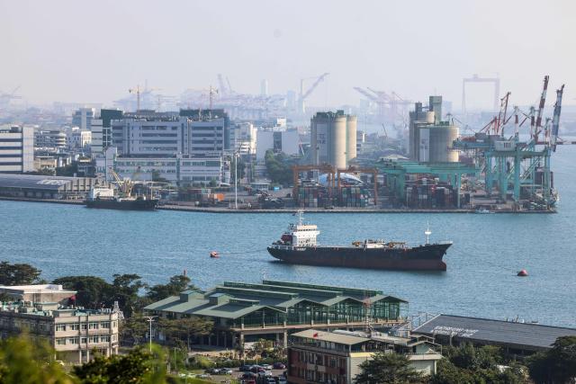 The Kaohsiung harbour is seen from a mountain in Kaohsiung on December 23, 2025. (Photo by I-Hwa Cheng / AFP)