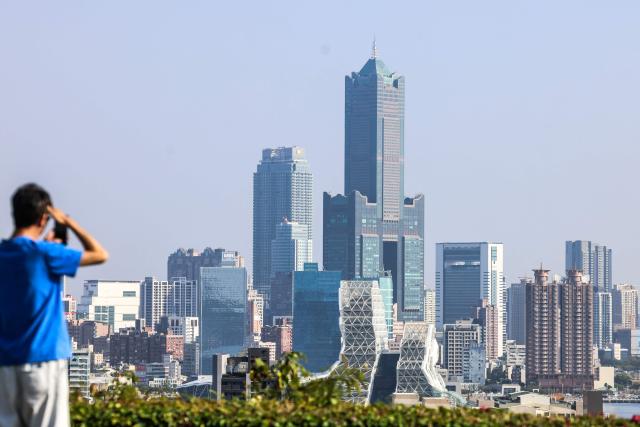 The Kaohsiung downtown is seen from a mountain in Kaohsiung on December 23, 2025. (Photo by I-Hwa Cheng / AFP)