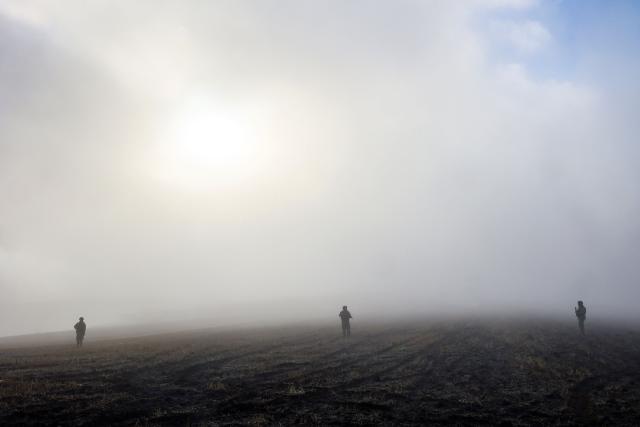 Turkish soldiers patrol as search and rescue operations continue at the wreckage site following the crash of a Libya-bound business jet carrying Libyan Chief of Staff General Muhammad Ali Ahmed Al-Haddad, found 2 kilometers south of Kesikkavak Village at Haymana district in Ankara on December 24, 2025. The head of Libya's armed forces and four other passengers died on Tuesday when their business jet crashed shortly after taking off from Ankara, officials in Turkey's capital and Tripoli said. The wreckage of their Falcon 50 aircraft was located by Turkish security personnel in the Haymana district near Ankara, Turkey's Interior Minister said. (Photo by ADEM ALTAN / AFP)