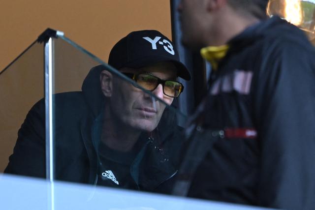 Former French footballer and father of Algeria's goalkeeper #23 Luca Zidane, Zinedine Zidane watches during the Africa Cup of Nations (CAN) Group E football match between Algeria and Sudan at Moulay Hassan Stadium in Rabat on December 24, 2025. (Photo by SEBASTIEN BOZON / AFP)