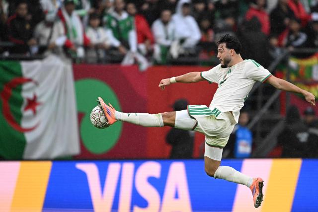 Algeria's midfielder #10 Ismael Bennacer controls the ball during the Africa Cup of Nations (CAN) Group E football match between Algeria and Sudan at Moulay Hassan Stadium in Rabat on December 24, 2025. (Photo by Gabriel BOUYS / AFP)