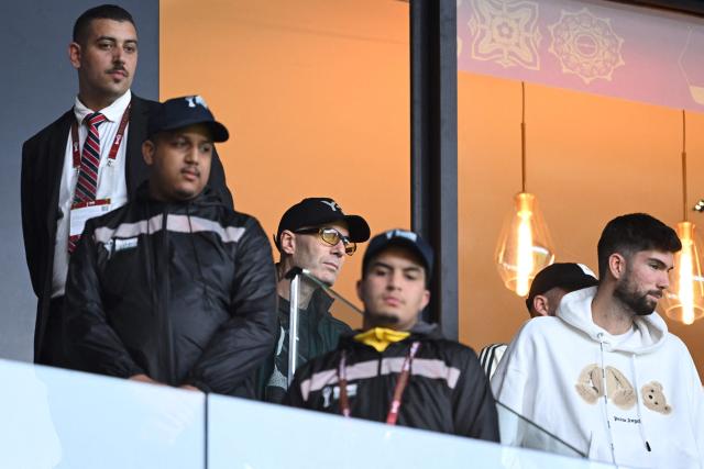 Former French footballer and father of Algeria's goalkeeper #23 Luca Zidane, Zinedine Zidane watches during the Africa Cup of Nations (CAN) Group E football match between Algeria and Sudan at Moulay Hassan Stadium in Rabat on December 24, 2025. (Photo by SEBASTIEN BOZON / AFP)