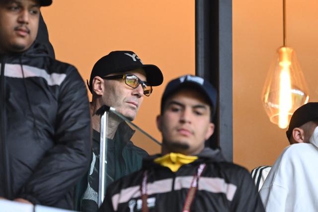 Former French footballer and father of Algeria's goalkeeper #23 Luca Zidane, Zinedine Zidane watches during the Africa Cup of Nations (CAN) Group E football match between Algeria and Sudan at Moulay Hassan Stadium in Rabat on December 24, 2025. (Photo by SEBASTIEN BOZON / AFP)
