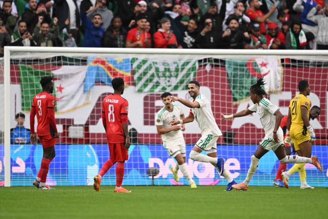 Algeria's forward #7 Riyad Mahrez celebrates scoring the team's second goal during the Africa Cup of Nations (CAN) Group E football match between Algeria and Sudan at Moulay Hassan Stadium in Rabat on December 24, 2025. (Photo by SEBASTIEN BOZON / AFP)