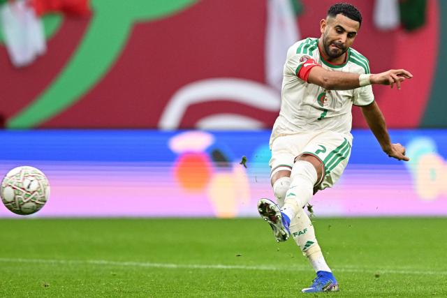 Algeria's forward #7 Riyad Mahrez scores the team's second goal during the Africa Cup of Nations (CAN) Group E football match between Algeria and Sudan at Moulay Hassan Stadium in Rabat on December 24, 2025. (Photo by Gabriel BOUYS / AFP)