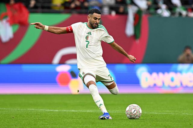 Algeria's forward #7 Riyad Mahrez scores the team's second goal during the Africa Cup of Nations (CAN) Group E football match between Algeria and Sudan at Moulay Hassan Stadium in Rabat on December 24, 2025. (Photo by Gabriel BOUYS / AFP)
