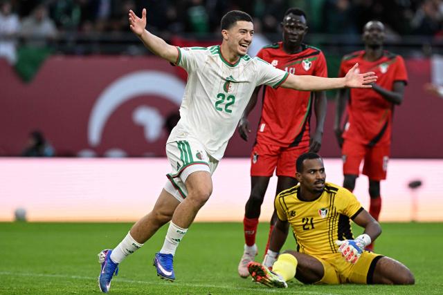 Algeria's midfielder #22 Ibrahim Maza celebrates scoring the team's third goal past Sudan's goalkeeper #21 Monged Elneel during the Africa Cup of Nations (CAN) Group E football match between Algeria and Sudan at Moulay Hassan Stadium in Rabat on December 24, 2025. (Photo by Gabriel BOUYS / AFP)