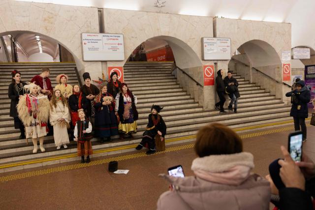 Participants of nativity scene, Vertep in Ukraine, perform in the subway in Kyiv on December 24, 2025, amid the Russian invasion of Ukraine. (Photo by Tetiana DZHAFAROVA / AFP)