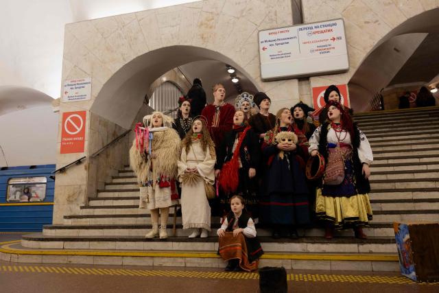 Participants of nativity scene, Vertep in Ukraine, perform in the subway in Kyiv on December 24, 2025, amid the Russian invasion of Ukraine. (Photo by Tetiana DZHAFAROVA / AFP)