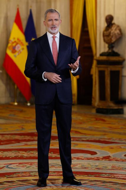 Spain's King Felipe VI delivers his traditional Christmas Eve speech  at the Royal Palace in Madrid and publicly broadcasted on December 24, 2025. King Felipe VI urged Spaniards to protect "democratic coexistence" against the perils of political polarisation, warning in a Christmas message broadcast today that "tension" was causing popular disaffection. (Photo by Andres BALLESTEROS / POOL / AFP)