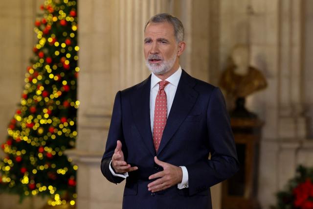 Spain's King Felipe VI delivers his traditional Christmas Eve speech  at the Royal Palace in Madrid and publicly broadcasted on December 24, 2025. King Felipe VI urged Spaniards to protect "democratic coexistence" against the perils of political polarisation, warning in a Christmas message broadcast today that "tension" was causing popular disaffection. (Photo by Andres BALLESTEROS / POOL / AFP)