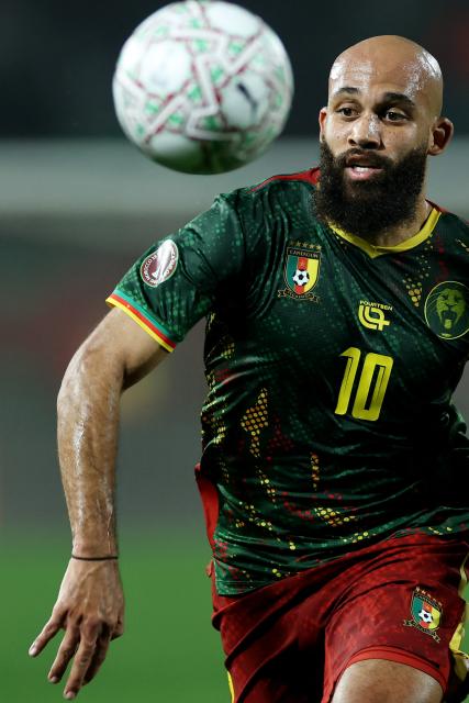 Cameroon's midfielder #10 Bryan Mbeumo runs with the ball during the Africa Cup of Nations (CAN) Group F football match between Cameroon and Gabon at Adrar Stadium in Agadir on December 24, 2025. (Photo by FRANCK FIFE / AFP)