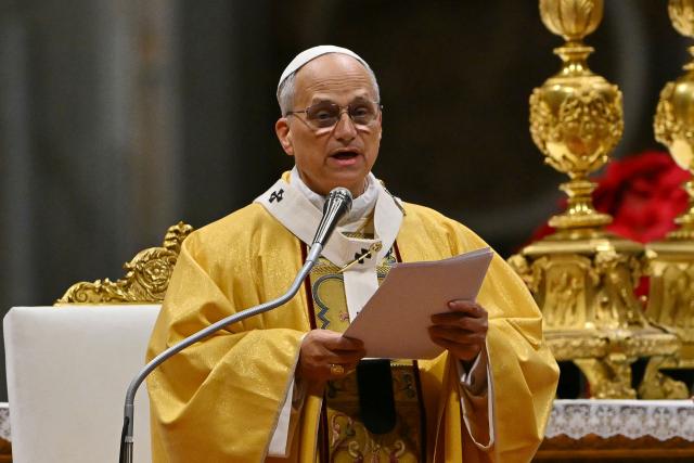 Pope Leo XIV performs the Christmas Eve mass at St Peter's Basilica in the Vatican on December 24, 2025. (Photo by Andreas SOLARO / AFP)