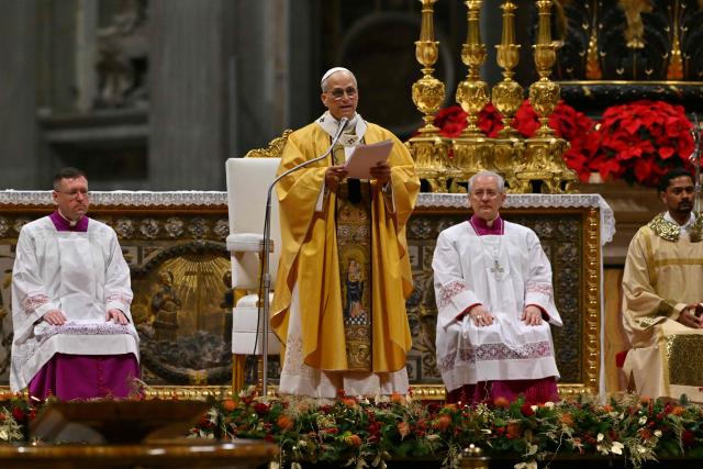 Pope Leo XIV performs the Christmas Eve mass at St Peter's Basilica in the Vatican on December 24, 2025. (Photo by Andreas SOLARO / AFP)
