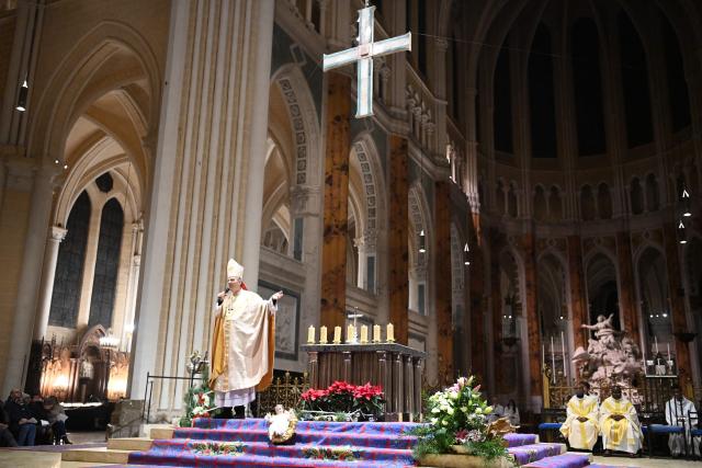 French bishop of Chartres Monsignor Philippe Christory celebrates the midnight Christmas mass at Cathedral of Our Lady of Chartres in Chartres on December 24 2025. (Photo by JEAN-FRANCOIS MONIER / AFP)