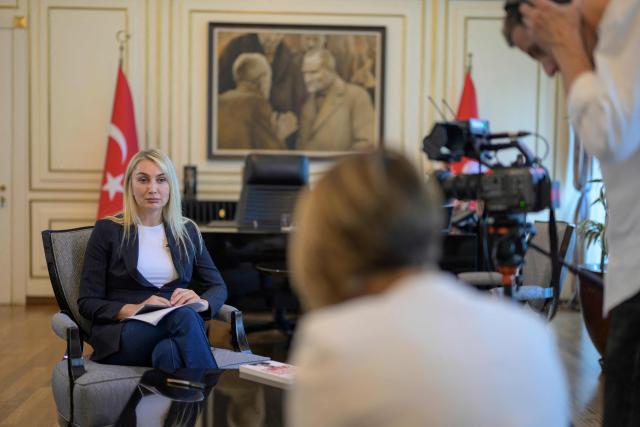 Dilek Imamoglu (R), the wife of jailed Istanbul mayor Ekrem Imamoglu of the main opposition Republican People's Party (CHP), looks on before an interview with AFP in Istanbul on September 19, 2025. Democracy has taken "heavy wounds" in Turkey since the jailing of Istanbul's popular opposition mayor in a major graft case, his wife told AFP, saying the ordeal had plunged their family into a painful period but strengthened their resolve to stand together. (Photo by Yasin AKGUL / AFP)
